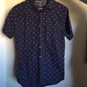 Navy blue button up shirt with real turtle pattern
